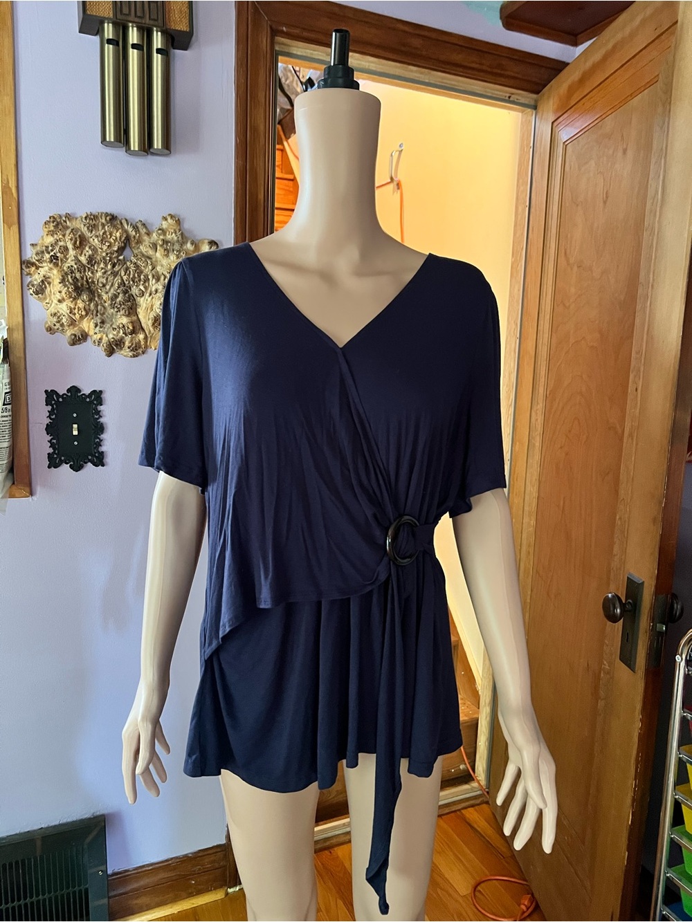 BloomChic Navy Wrap-Front Short Sleeve Top with Ring Accent